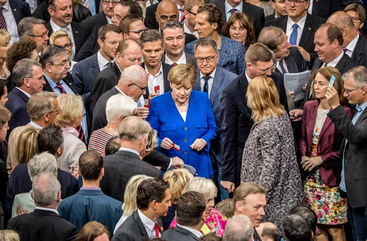 В Германии тенденция похожа на украинскую: чем ближе депутат к власти, тем больше у него дополнительные заработки.